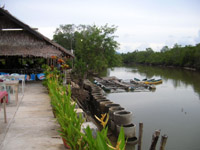 Chai Yo Restaurant on the bank of a small river