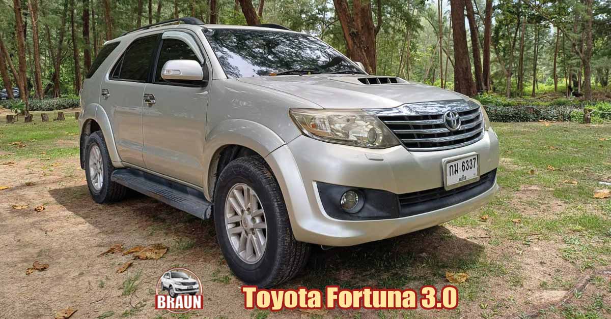 3 litre toyota fortuna sports utility vehicle in bronze parked offroad in a phuket woodland area from phuker car rental
